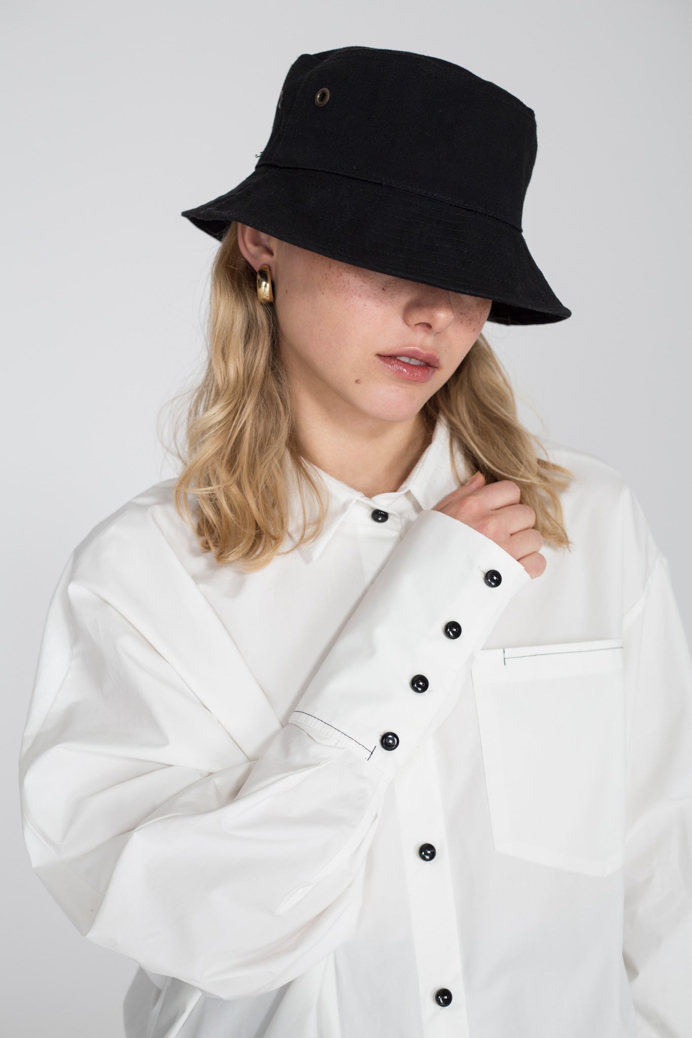 Oversized white shirt with one wide sleeve