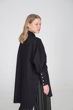 Oversized black shirt with one wide sleeve