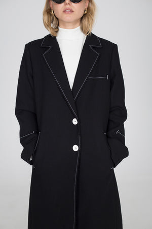 Coat with white line